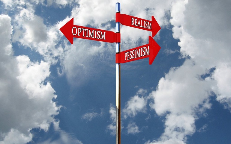 Skilt med optimisme, pessimisme og realisme